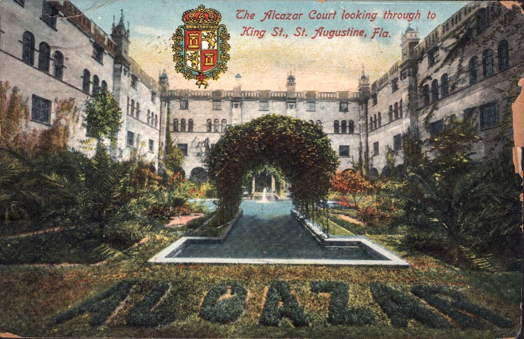 A color postcard of the Hotel Alcazar's courtyard looking from King Street. The word ALCAZAR is written in shrubbery.